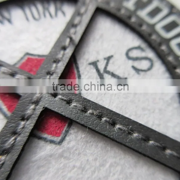 China Custom Logo Unique Felt Embroidery PU Badge photo-3