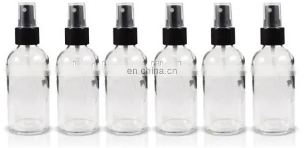 1 oz Clear Boston Round Glass Bottle With Black Fine Mist Spray photo-2