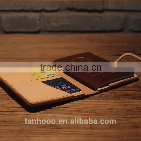 Genuine Leather Passport Holder Wallet Slim Travel Wallet Passport Holder in Embossed Logo photo-4