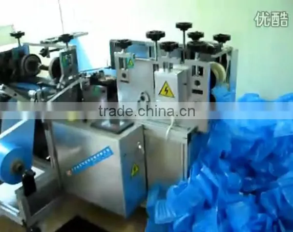 AUTOMATIC PE SHOE COVER MAKING MACHINERY photo-3