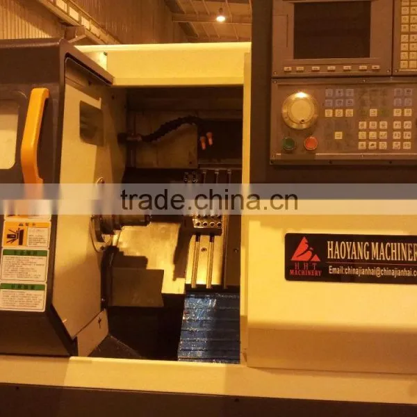TCK-32L Slant Bed Cnc Lathe Machine With Bar Feeder photo-4