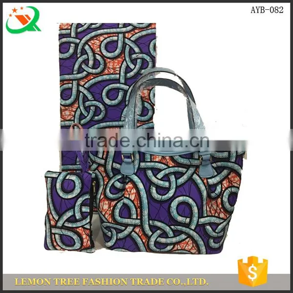 African Wax Fabrics With Waxed Cotton Duffle Bag Super Wax and Matching Bag