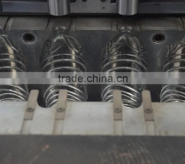 High Quality Semi Automatic 4 Cavities Drinking Water Bottle Blow Molding Machine photo-5
