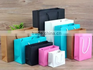Newest Design Customer Logo Printed Paper Handbags Luxury Packaging Paper Bags Fashion Promotional Garment Bag photo-6