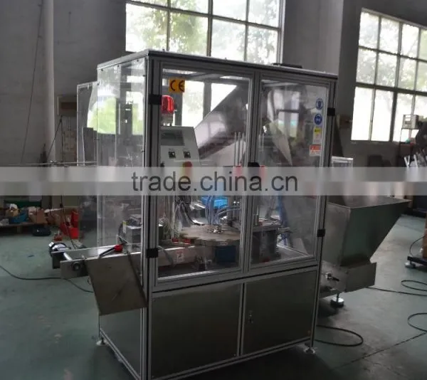 Automatic plastic machine for filling shim into cover