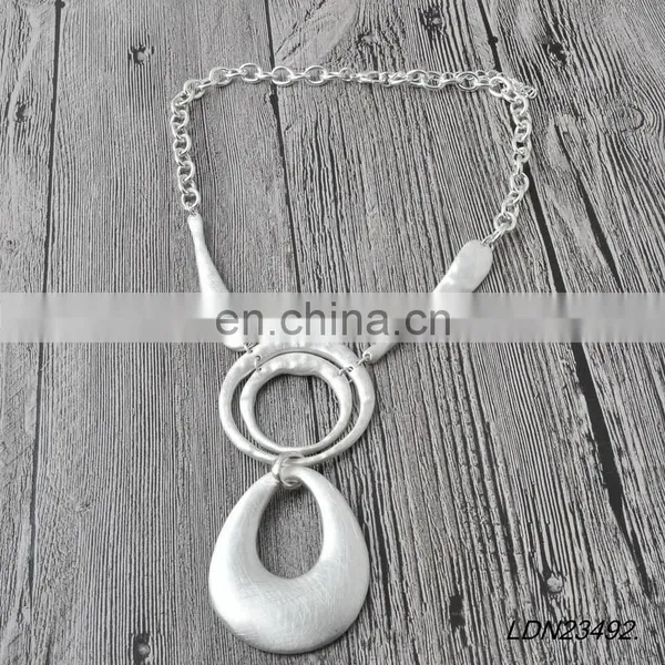 Silver Hammered Circle Necklace photo-6