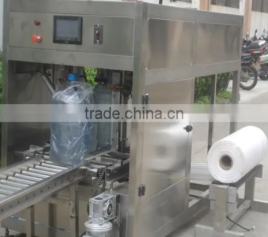 Outer bag 5gallon bottle packing machine/5gallon PC bottle outside packing machine