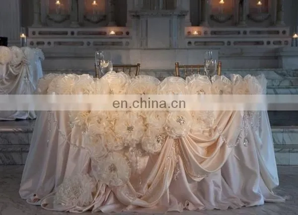 China Supplier Pink Rosette Table Skirting Designs for Wedding photo-2