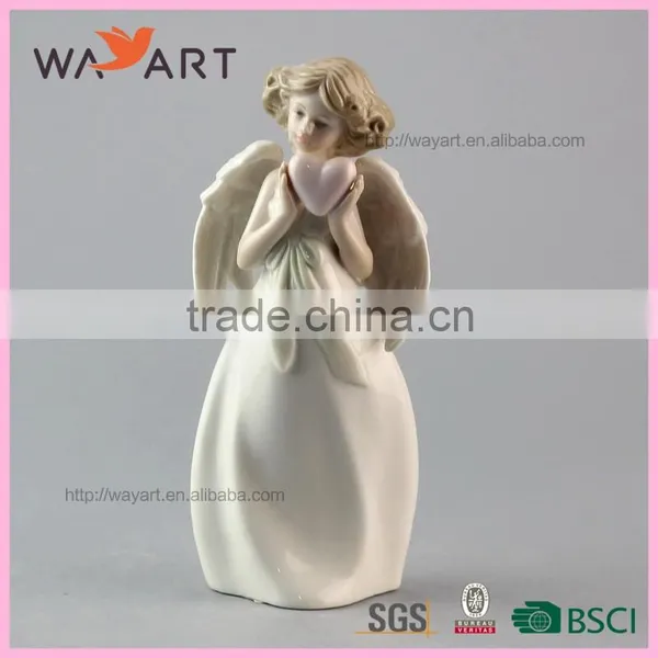 Unique Decorative White Ceramic Angel Statue With Heart photo-3