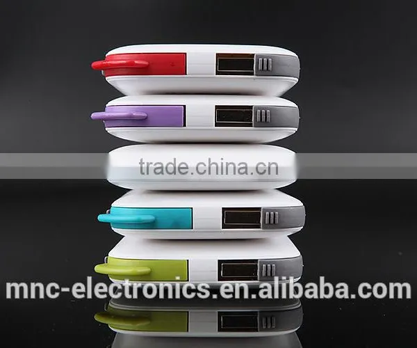 Real 6000mAh Ultra Slim Built in Cable Custom Logo Printing Dual Output 2A Fast Charging Power Bank Charger photo-4