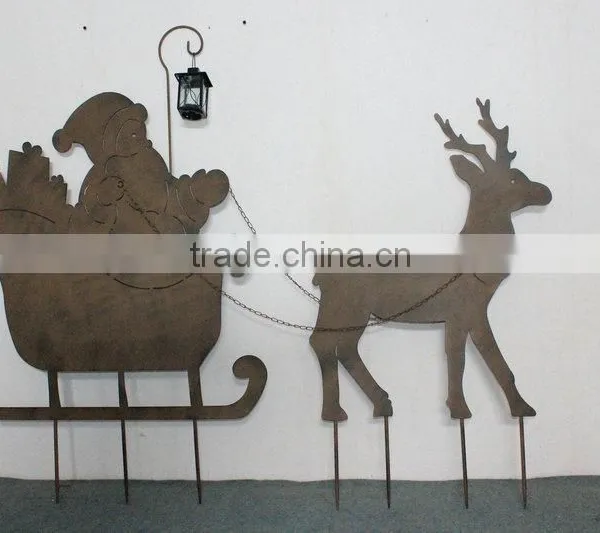 Metal santadriving reindeer sleigh
