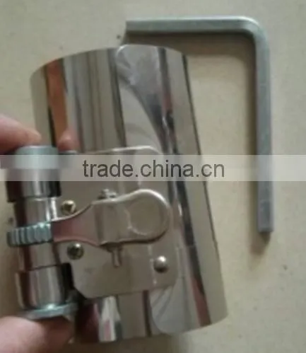 Piston ring compressor