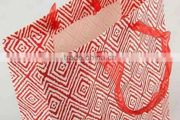 Colorful Shopping Paper Bag Through Foaming Process/Printed Foldable Gift Bag photo-3