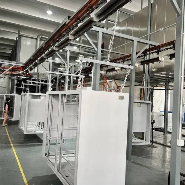 Automated Powder Spraying Workstation Optimized For Mass Manufacturing Of Metal Cabinet Shells