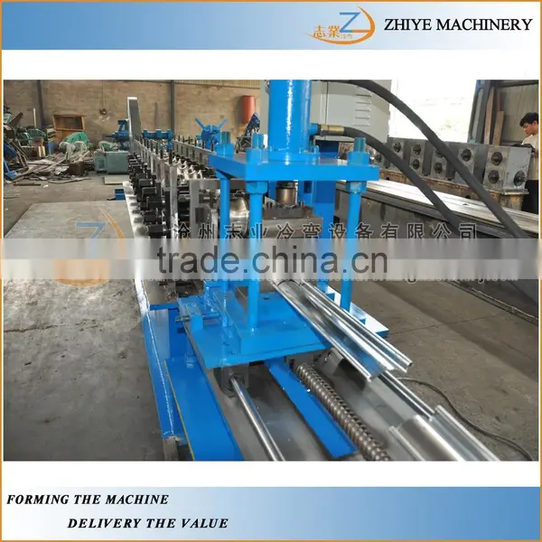 Metal Roller Shuttering Door Roll Forming Machine/Colored Steel Rolling Door Making Machine photo-3