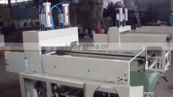HIGH SPEED DOUBLE LINE HOT CUTTING T-SHIRT BAG MAKING MACHINE photo-3