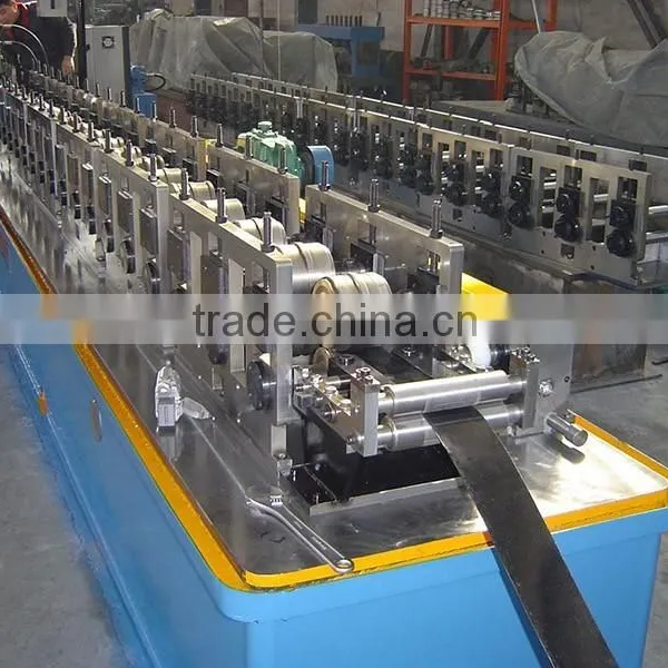 New Type Color Steel Sheet Roller Shutter Door Roll Forming Machine With Punching, Rolling Shutter Slats Roll Forming Machine photo-2