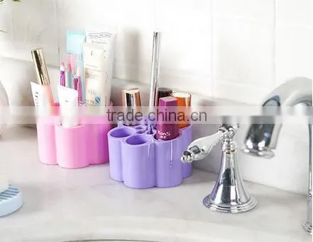 Cy269 Plastic Plum Blossom Shaped Dressing Table Cosmetic Storage Box Candy Color Desktop Separating Arrangement Box photo-4