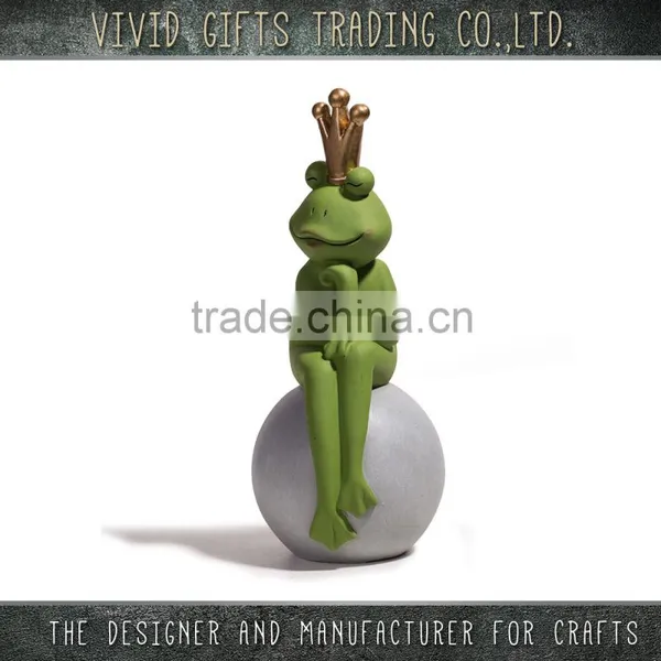Ceramic or Porcelain Frog With Gold Crown Sitting on Ball for Home and Garden Decoration