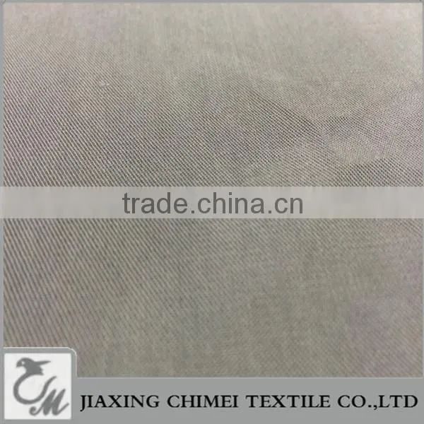 Jiaxing Popular Shirt Fabric of Twill Fabric Cupro Polyester Fabric photo-3