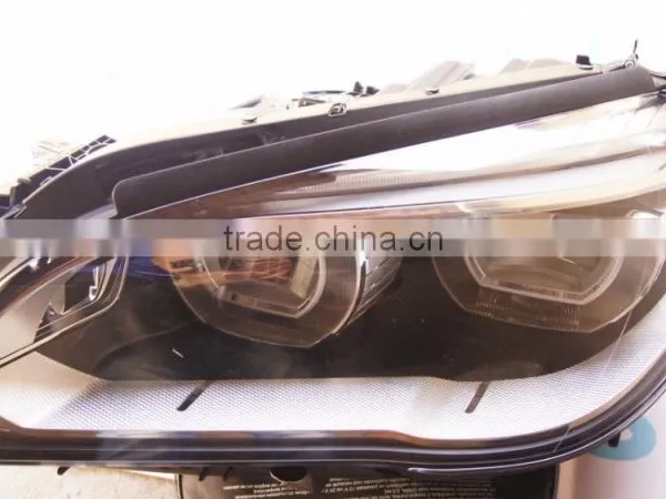 63117348496 HEAD LIGHT GENUINE