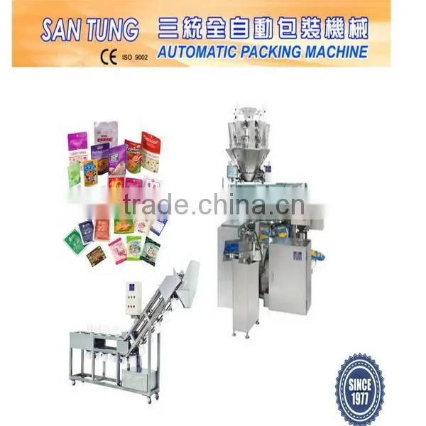 Automatic pouch filling and packing machine