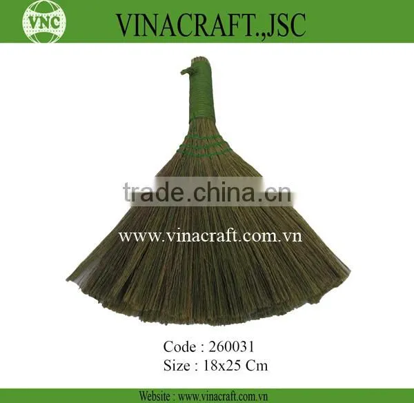 Small grass broom with plastic twist on handle