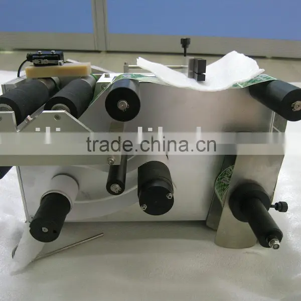 labeling machine ,adhesive labeling machine , bottle labeling machine