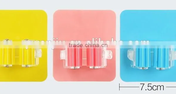 Wholesale Stock Magic Wall Suction Plastic Mop Handle Storage Holder photo-2