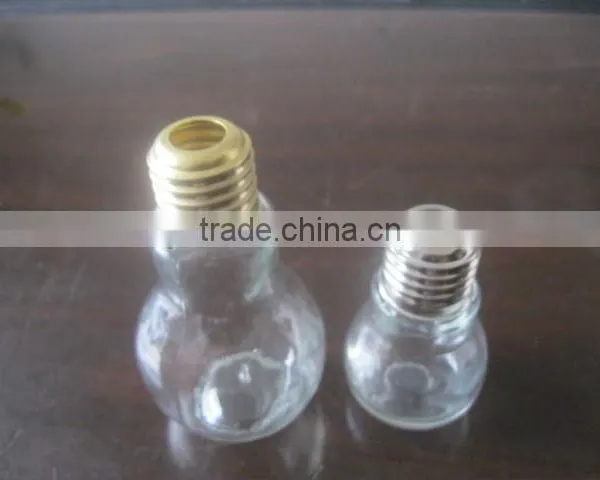 glass bulb shaped vase with metal lid