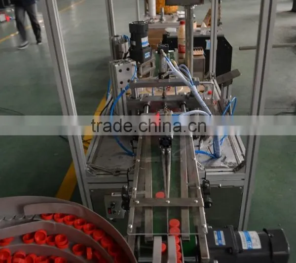Automatic Plastic Cover Dropping Machine photo-3