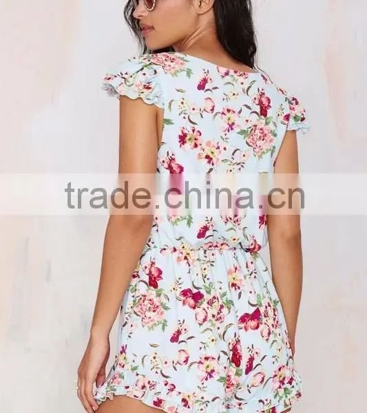 Light Blue Colorful Floral Print Romper Tie Closure At Neck Above Cutout & Ruffled Detailing At Hem And Sleeves photo-4