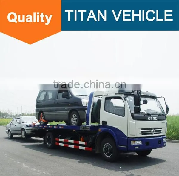 Sinotruck Howo Heavy Duty Flatbed Rotator Tow Truck Wrecker Wheel Lift for Sale With Arm Crane photo-3