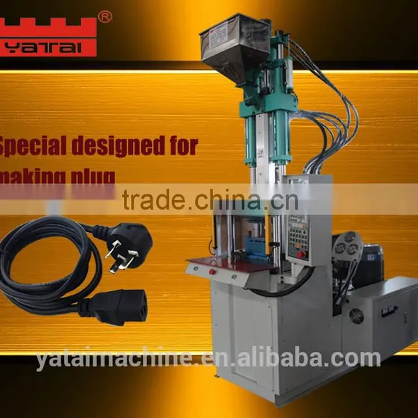 Plug insert injection molding machine