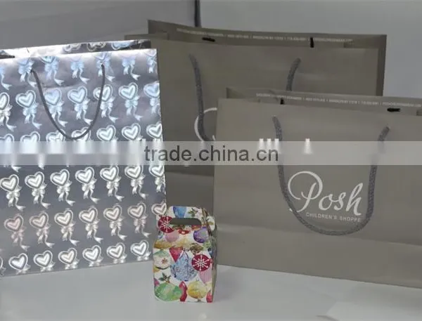 Kraft Paper Waterproof Paper Gift Bag With Ribbon Handles photo-4