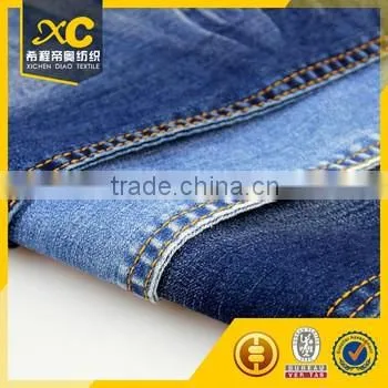 Woven 4.5 oz no Slub Cotton Poly Rolls of Denim Fabric for Man Jeans photo-5