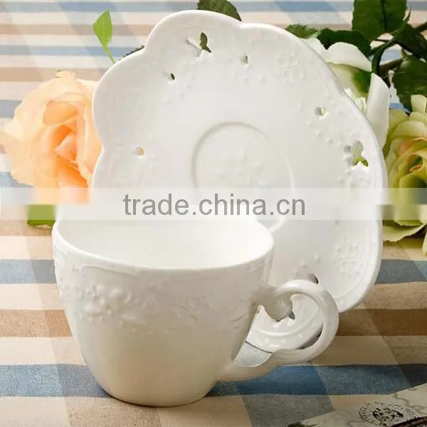 Creative White Pierced Lace Bulk Ceramic Tea Cup and Saucer Sets