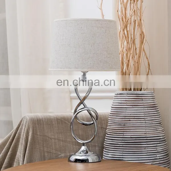 UK Simple Geometric Modeling Custom Iron Base Hotel Desk Light Cheap Silver Nightstand Lamp for Home Table photo-2