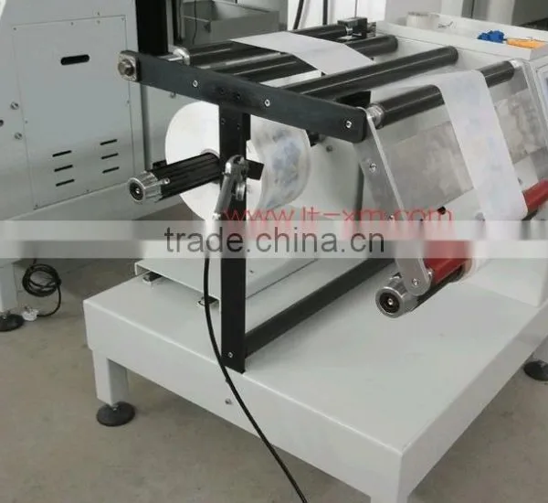 Automatic rewinding machine for non-woven fabric