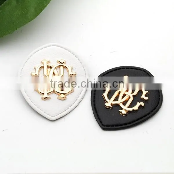 Black/white PU Leather Sew on Patches Fashion Labels With Metal Logo Clothing Label for Jeans/jacket PLB-001 photo-3