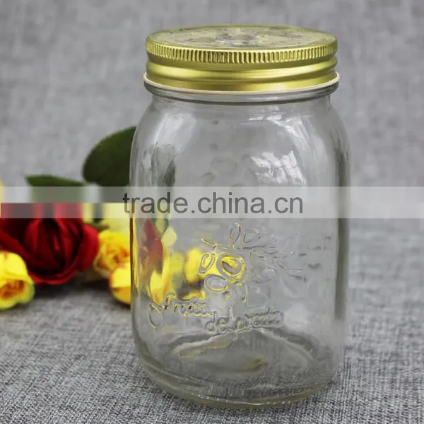 Set of glass mason jar for jam with golden cap