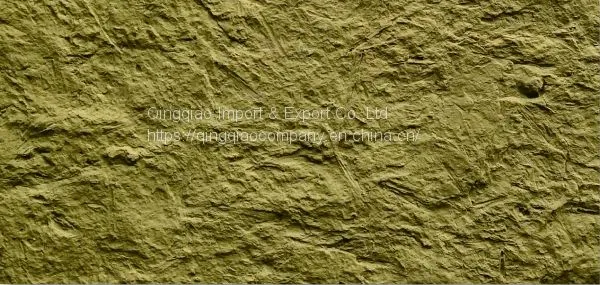A New Building Material of Rammed Earth Wall of Flexible Stone for Outdoor Building