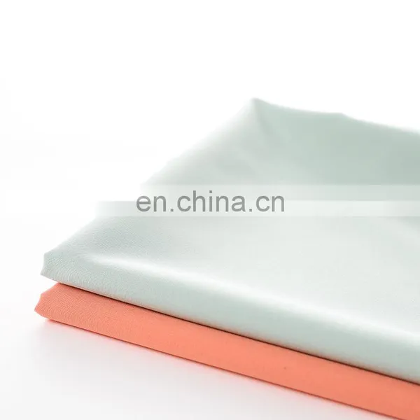 High Quality 100D Polyester 4 Way Stretch Fabric Plain Woven Polyester Spandex Fabric Fashion Textile Material photo-6