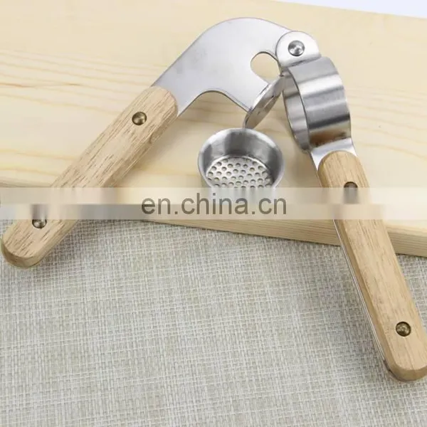 Hot Sale Stainless Steel Garlic Press With Wooden Handle photo-3
