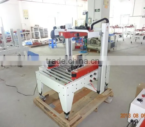 Automatic Monoblock Taping Carton Packing Machine photo-2