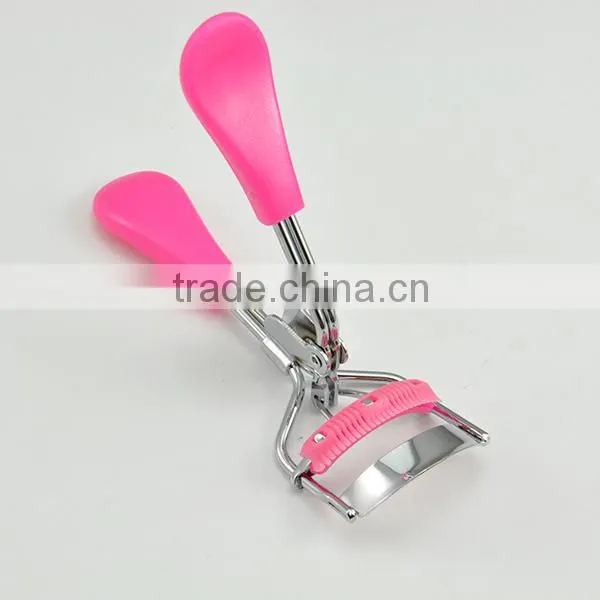 Good quality plastic handle pink eyelash curler with comb