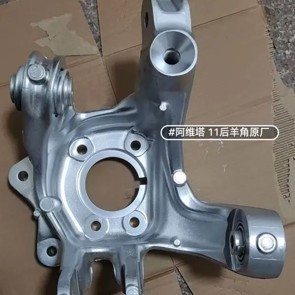 Rear wheel steering knuckle