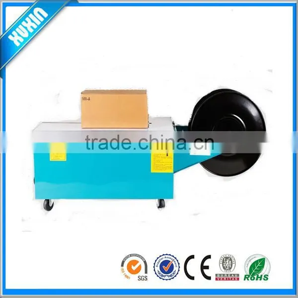 Low-profile semi-automatic balers hot melt strapping machine