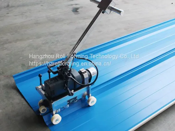 AUTOMATIC ROOF SEAMING MACHINE
