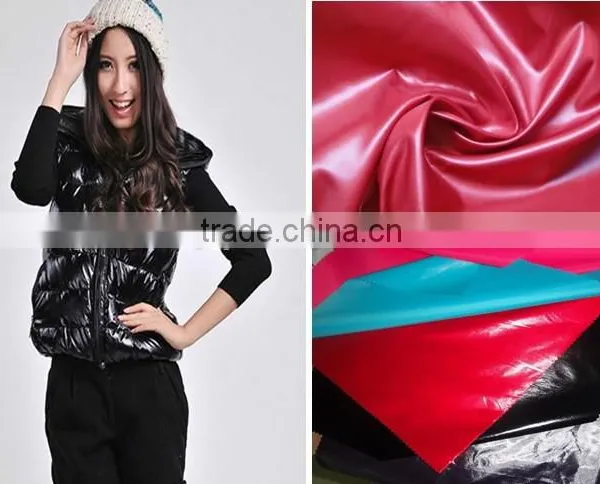 Wholesale China 2014 Newly Textile Heavy Cired Waterproof Polyester Taffeta Product for Garment, Lining, Suit, Jacket,proof Coat